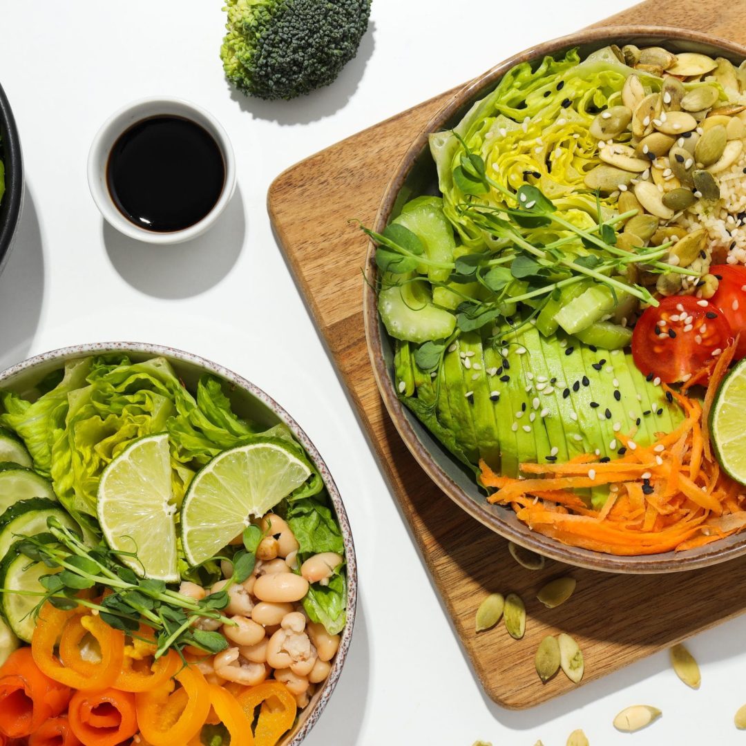 Bowls with tasty and nutritious food, top view